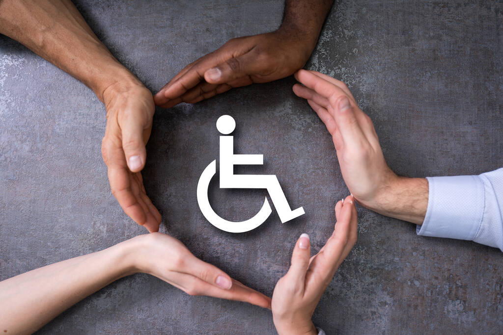 hands protecting disabled handicap icon